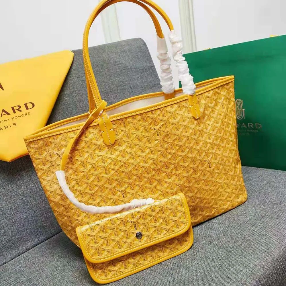 Goyard Sac Artois MM in Goyardine Canvas & Chevroches Calfskin for Women in Yellow Goyard Sac Artois MM in Goyardine Canvas & Chevroches Calfskin for Women in Yellow
