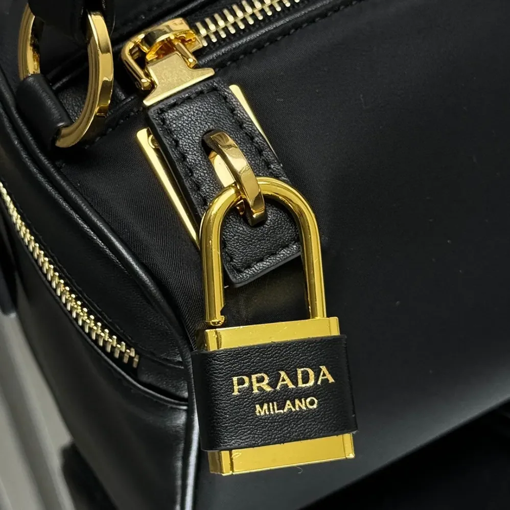 Prada Medium Re-Nylon and Leather Shoulder Bag with Padlock for Women Prada Medium Re-Nylon and Leather Shoulder Bag with Padlock for Women