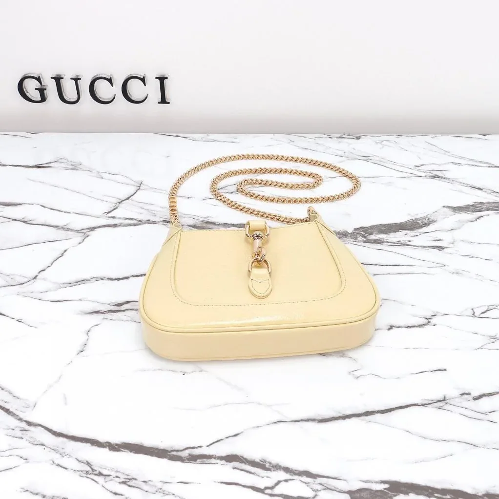 Gucci Jackie Notte Mini Crossbody Bag in Light Yellow Gold Hardware