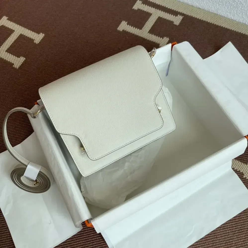 Hermes Roulis Mini Bag in Evercolor Calfskin for Women in White/Gold Hermes Roulis Mini Bag in Evercolor Calfskin for Women in White/Gold