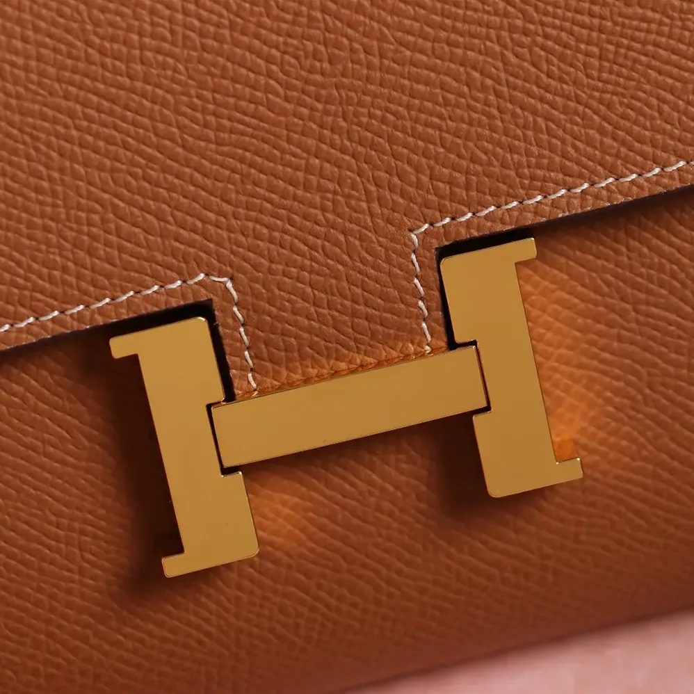 Hermes Constance Long To Go in Epsom Leather for Women in Brown/Gold