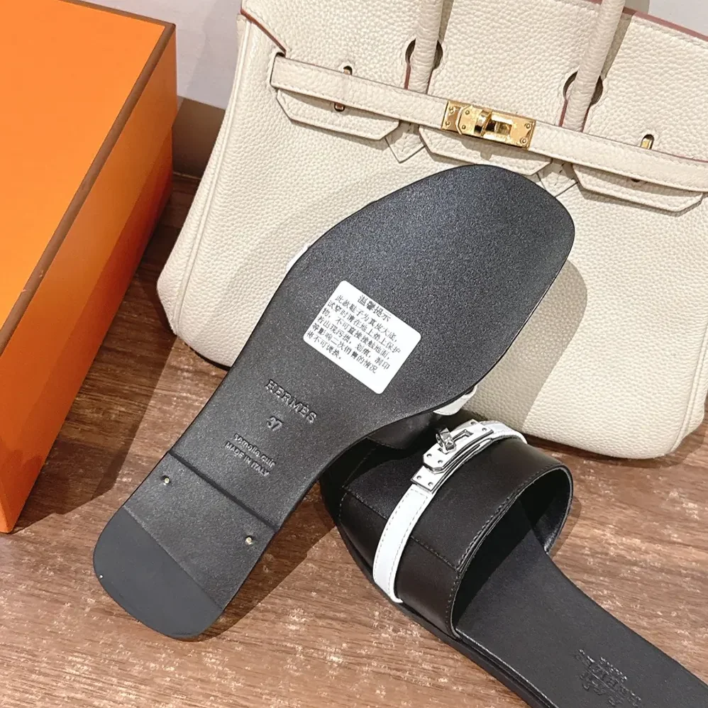 Hermes Giulia sandal for Unisex in Black/White