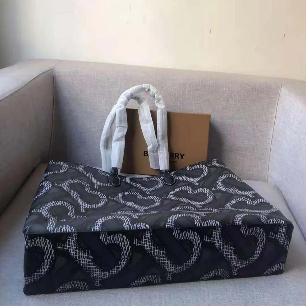 Burberry Monogram Print E-canvas Tote Bag for Women in Black Burberry Monogram Print E-canvas Tote Bag for Women in Black