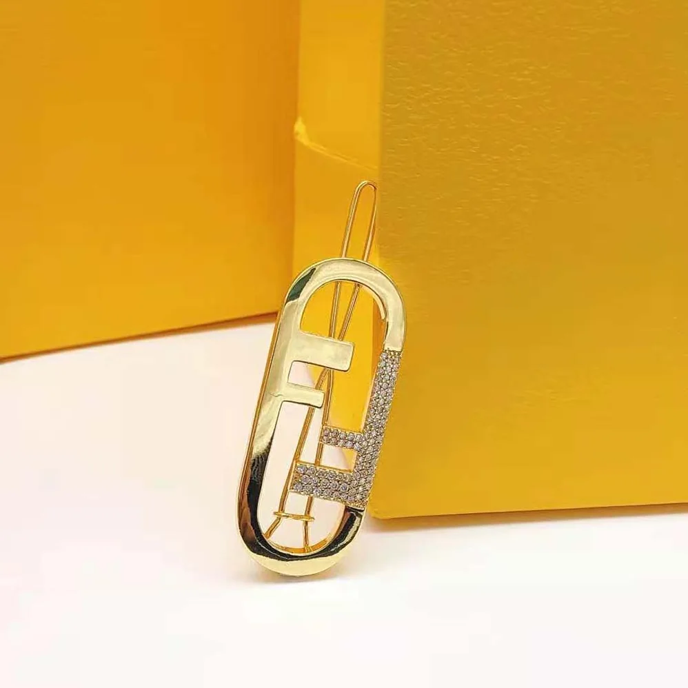Fendi O'Lock Hair Clip Gold for Women in Coloured Fendi O'Lock Hair Clip Gold for Women in Coloured
