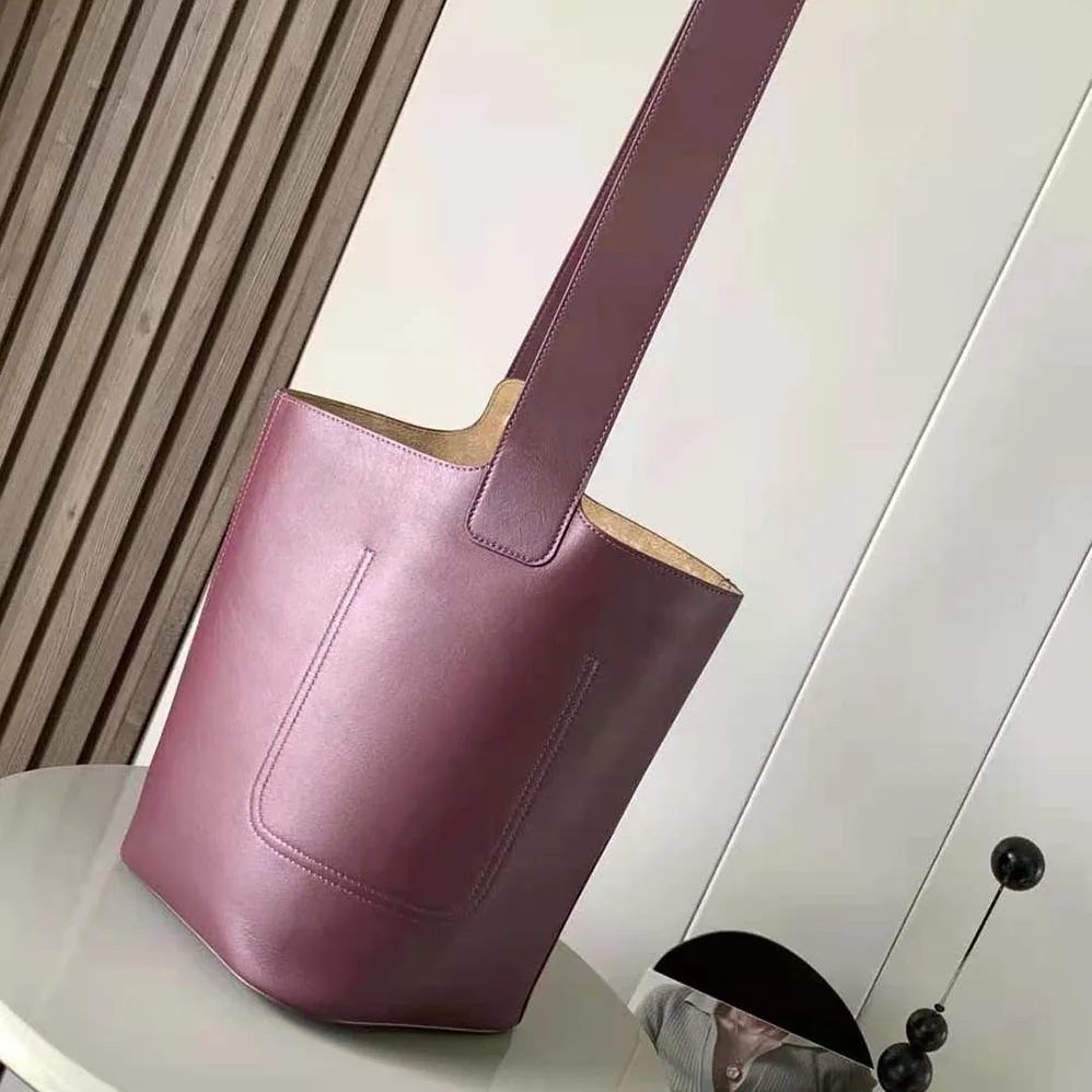 Loewe Mini Pebble Bucket Bag in Mellow Calfskin for Unisex in Maroon