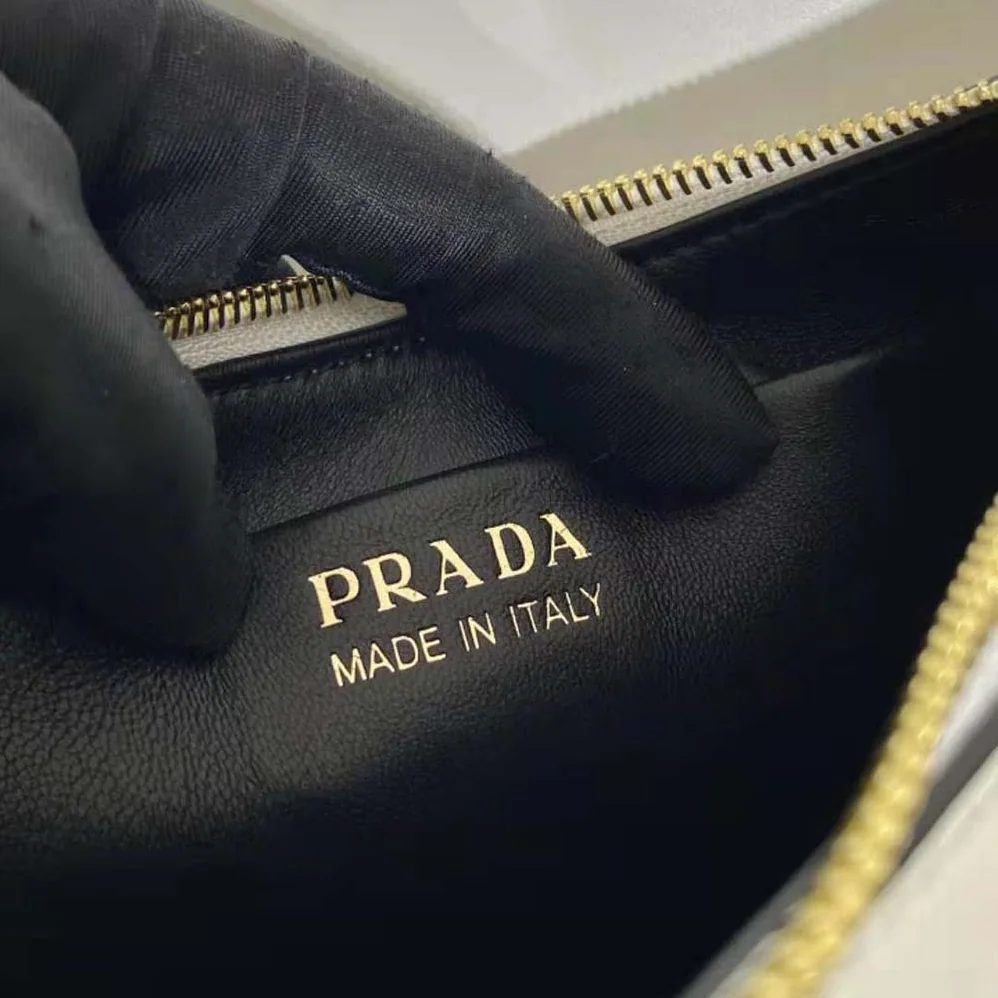 Prada Leather Shoulder Bag with Enameled Metal Triangle Logo for Women in White