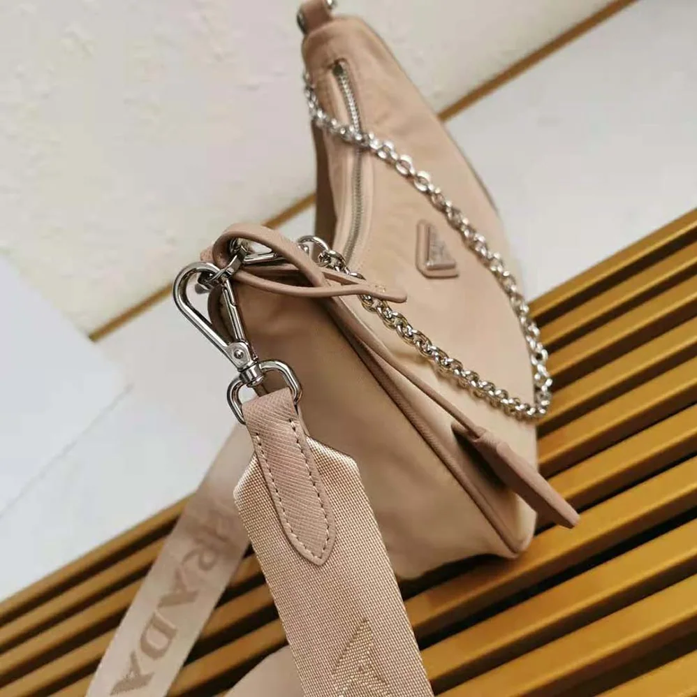 Prada Prada Re-Edition 2005 Nylon Bag for Women in Pink Prada Prada Re-Edition 2005 Nylon Bag for Women in Pink