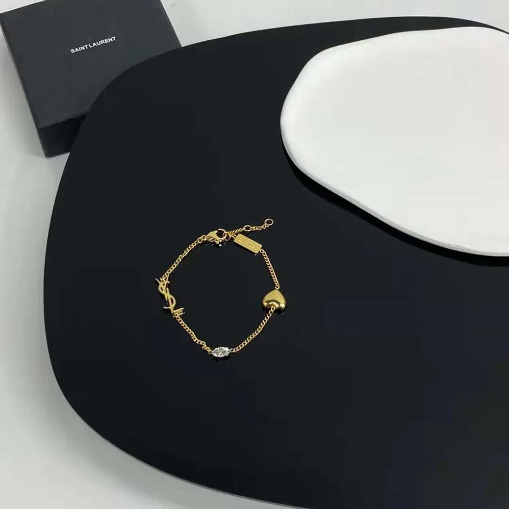 Saint Laurent YSL Opyum Heart Charm Bracelet in Metal for Women