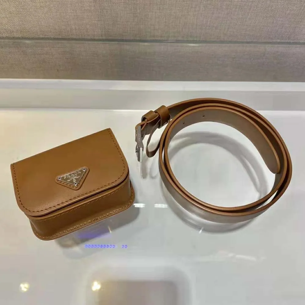 Prada Leather Belt With a Hybrid Multifunctional Design for Women in Brown Prada Leather Belt With a Hybrid Multifunctional Design for Women in Brown
