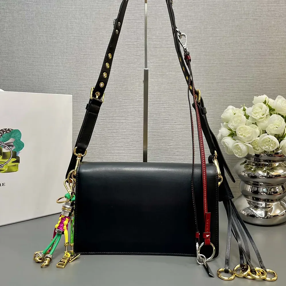 Prada Soft Sound Small Leather Shoulder Bag with Charms for Women in Black