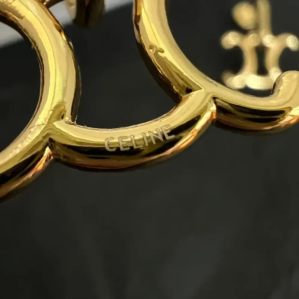 Celine Triomphe Lock Earrings in Brass with Gold Finish for Women in Gold Celine Triomphe Lock Earrings in Brass with Gold Finish for Women in Gold
