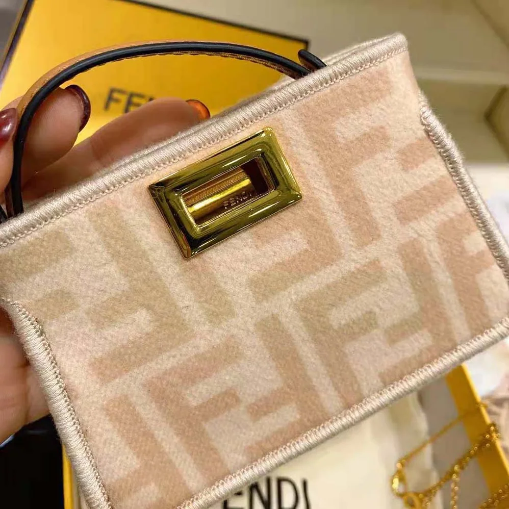 Fendi Nano Peekaboo Charm Beige Wool Charm for Women in Pink Fendi Nano Peekaboo Charm Beige Wool Charm for Women in Pink