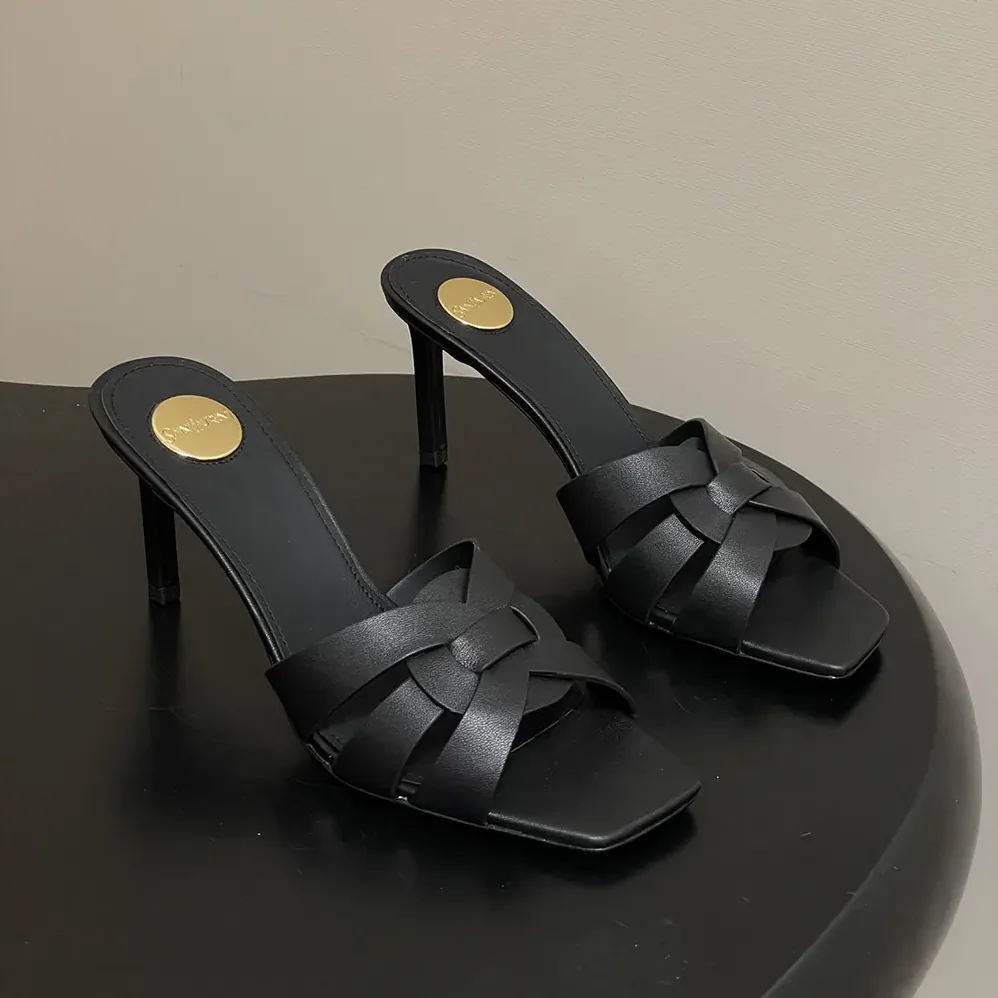 Saint Laurent YSL Tribute Mules in Smooth Leather for Women in Black Saint Laurent YSL Tribute Mules in Smooth Leather for Women in Black