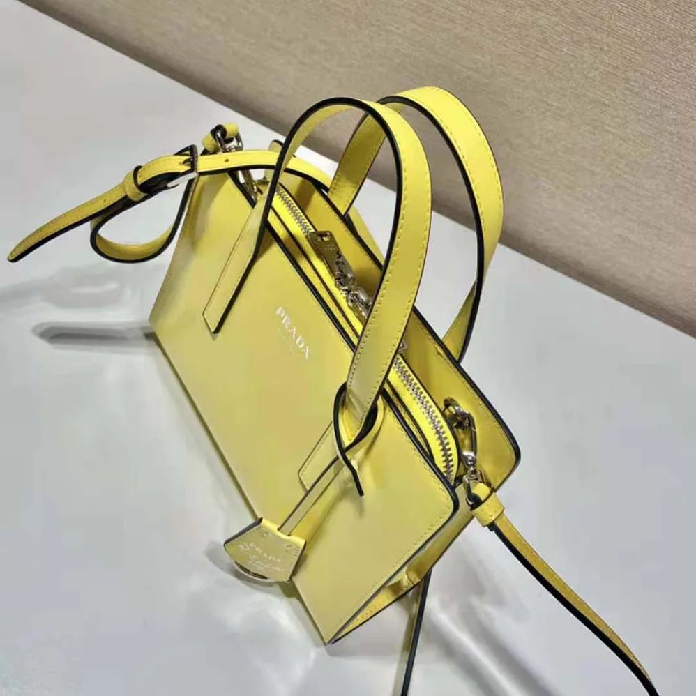 Prada Re-Edition 1995 Brushed-Leather Mini Handbag for Women in Yellow Prada Re-Edition 1995 Brushed-Leather Mini Handbag for Women in Yellow