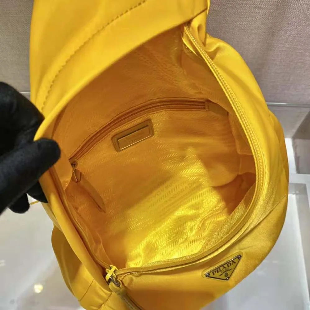 Prada Re-Nylon and Leather Backpack for Women in Yellow