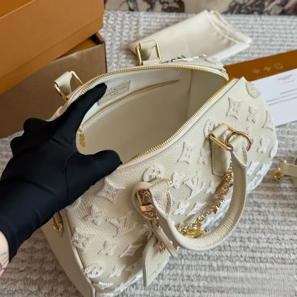 Louis Vuitton Speedy Bandouliere 25 Top Handle Bag in Cream Gold Hardware Louis Vuitton Speedy Bandouliere 25 Top Handle Bag in Cream Gold Hardware