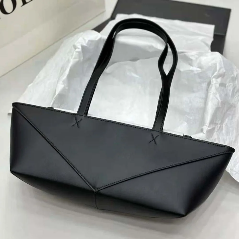 Loewe Cropped Puzzle Fold Bag in Shiny Calfskin for Women in Black Loewe Cropped Puzzle Fold Bag in Shiny Calfskin for Women in Black