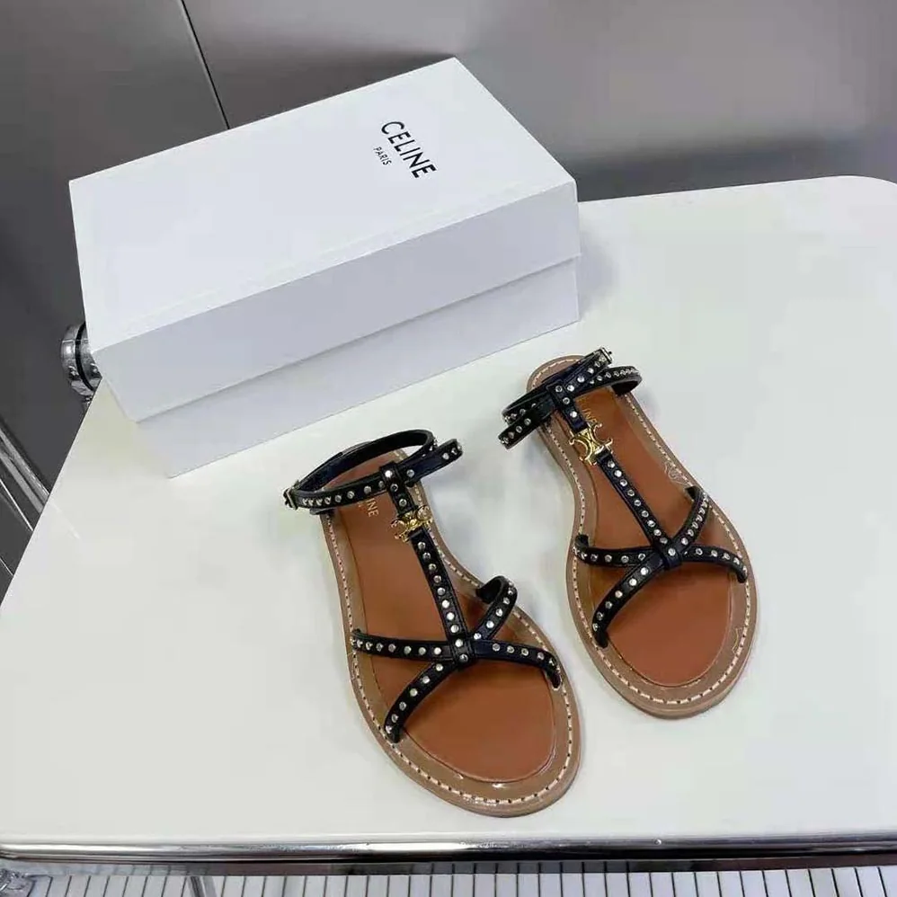 Celine Taillat Flat Sandal with Studs in Calfskin – Vegetal Tanning & Studs for Women in Black Celine Taillat Flat Sandal with Studs in Calfskin – Vegetal Tanning & Studs for Women in Black