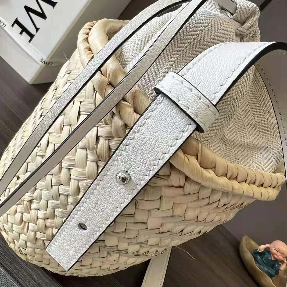 Loewe Drawstring Bucket Bag in Palm Leaf and Calfskin for Women in White Loewe Drawstring Bucket Bag in Palm Leaf and Calfskin for Women in White