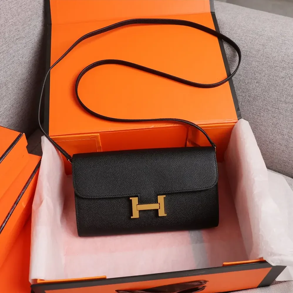 Hermes Constance Long To Go in Epsom Leather for Women in Black/Gold