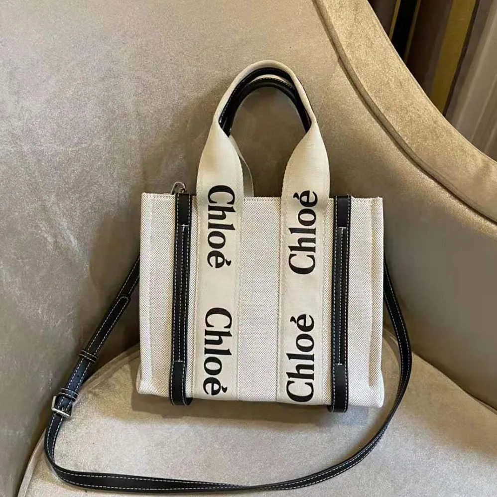 Chloe Small Woody Tote Bag in Cotton Canvas and Shiny Calfskin with Woody Ribbo for Women in Black Chloe Small Woody Tote Bag in Cotton Canvas and Shiny Calfskin with Woody Ribbo for Women in Black