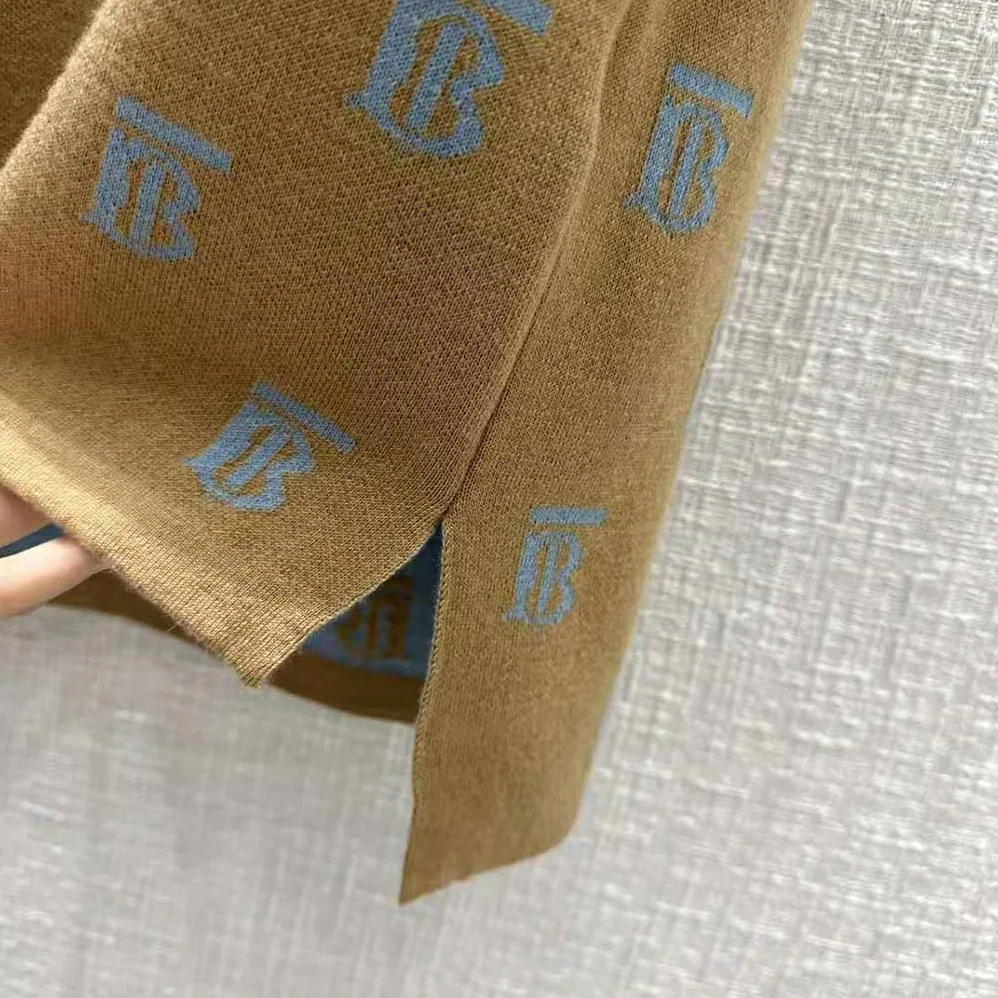 Burberry Monogram Wool Silk Blend Polo Shirt for Women