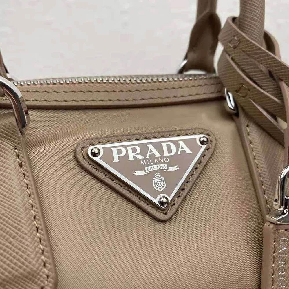 Prada Prada Re-Edition 2005 Nylon Bag for Women in Sandy Prada Prada Re-Edition 2005 Nylon Bag for Women in Sandy