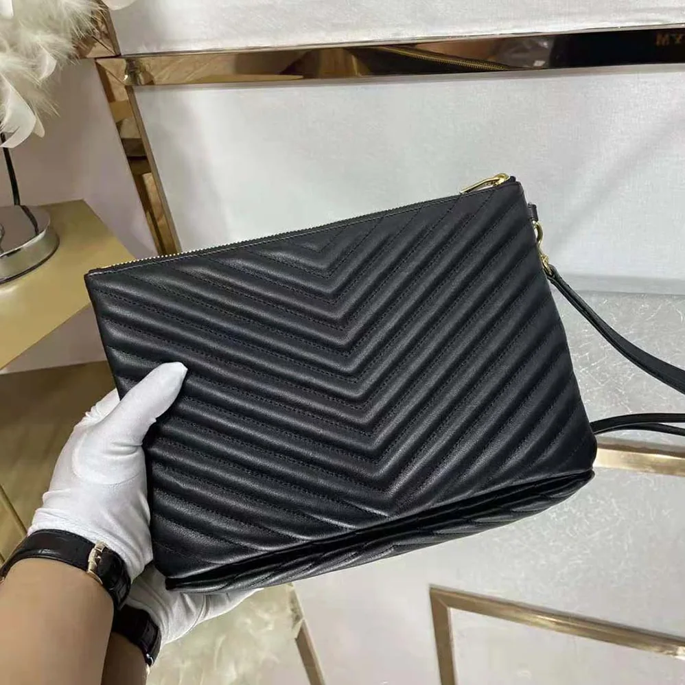Saint Laurent YSL Monogram Tablet Pouch in Matelassé Leather for Women in Black Saint Laurent YSL Monogram Tablet Pouch in Matelassé Leather for Women in Black