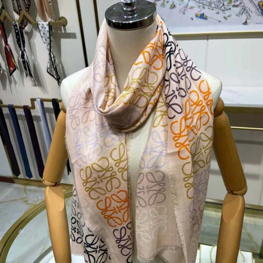 Loewe Anagram Lines Scarf in Wool and Cashmere for Women in White Loewe Anagram Lines Scarf in Wool and Cashmere for Women in White