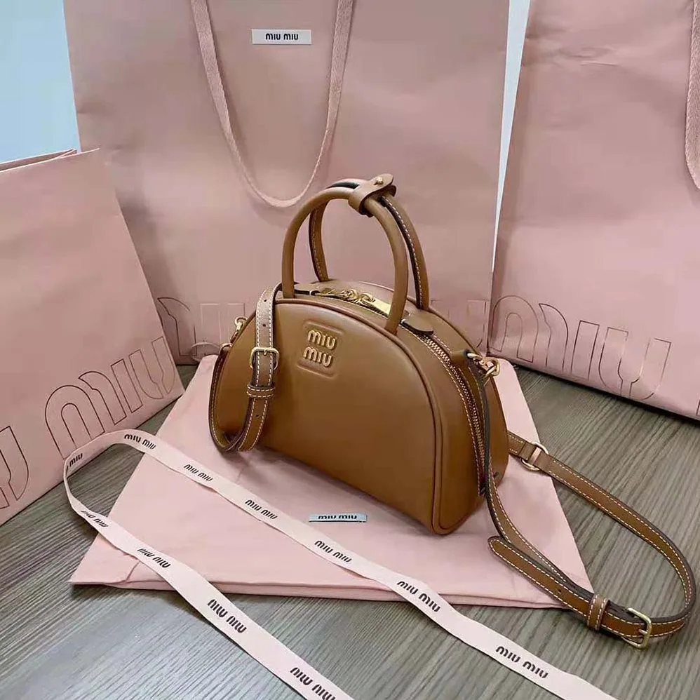 Miu Miu Medium Leather Top-handle Bag for Women in Brown