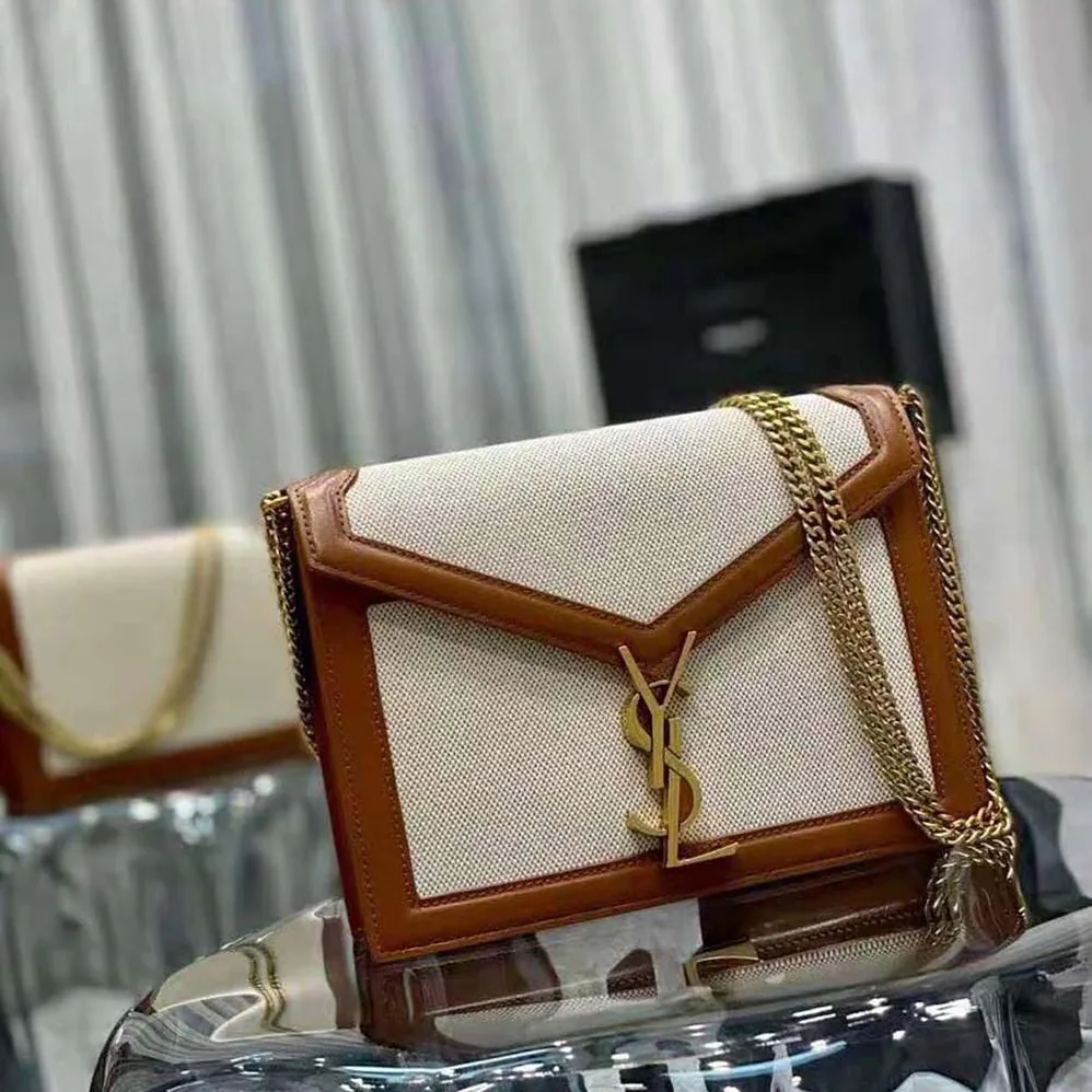 Saint Laurent YSL Cassandra Monogram Clasp Bag in Canvas and Smooth Leather for Women