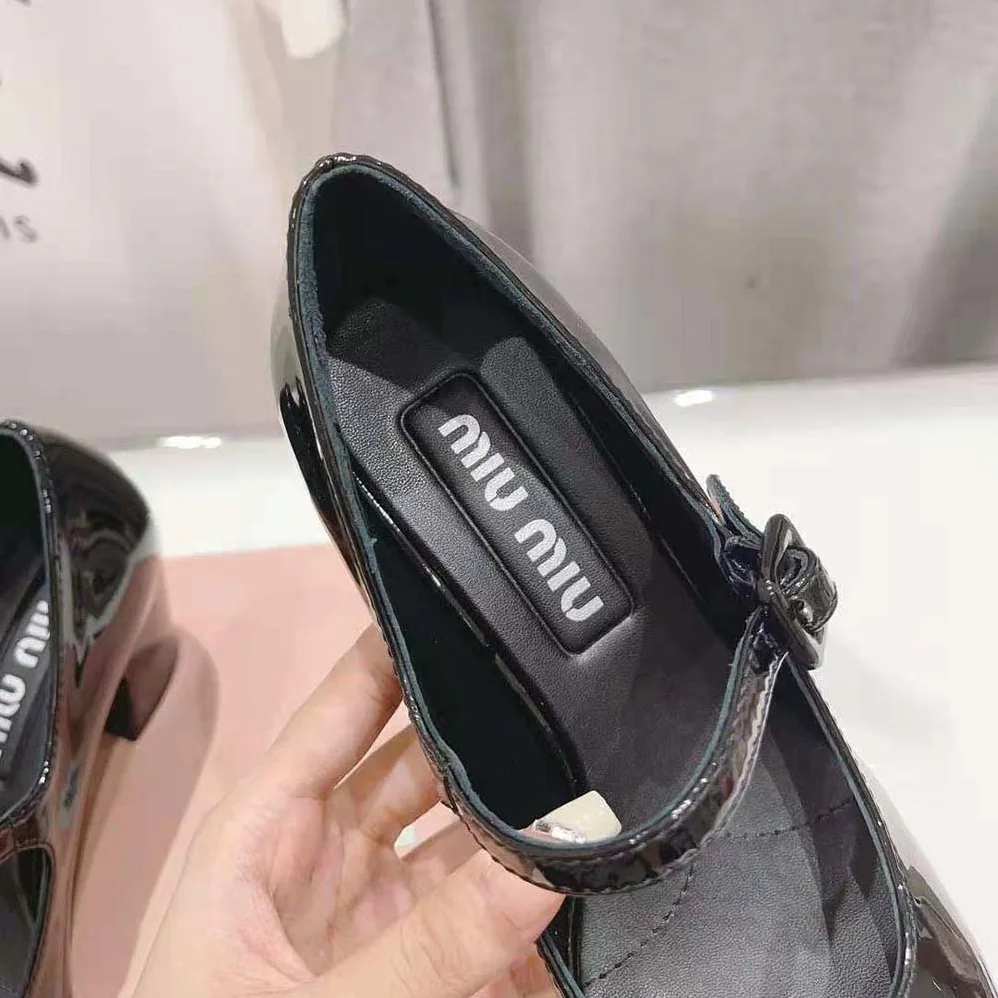 Miu Miu Patent Leather Pumps with Metal Lettering Logo for Women in Black Miu Miu Patent Leather Pumps with Metal Lettering Logo for Women in Black
