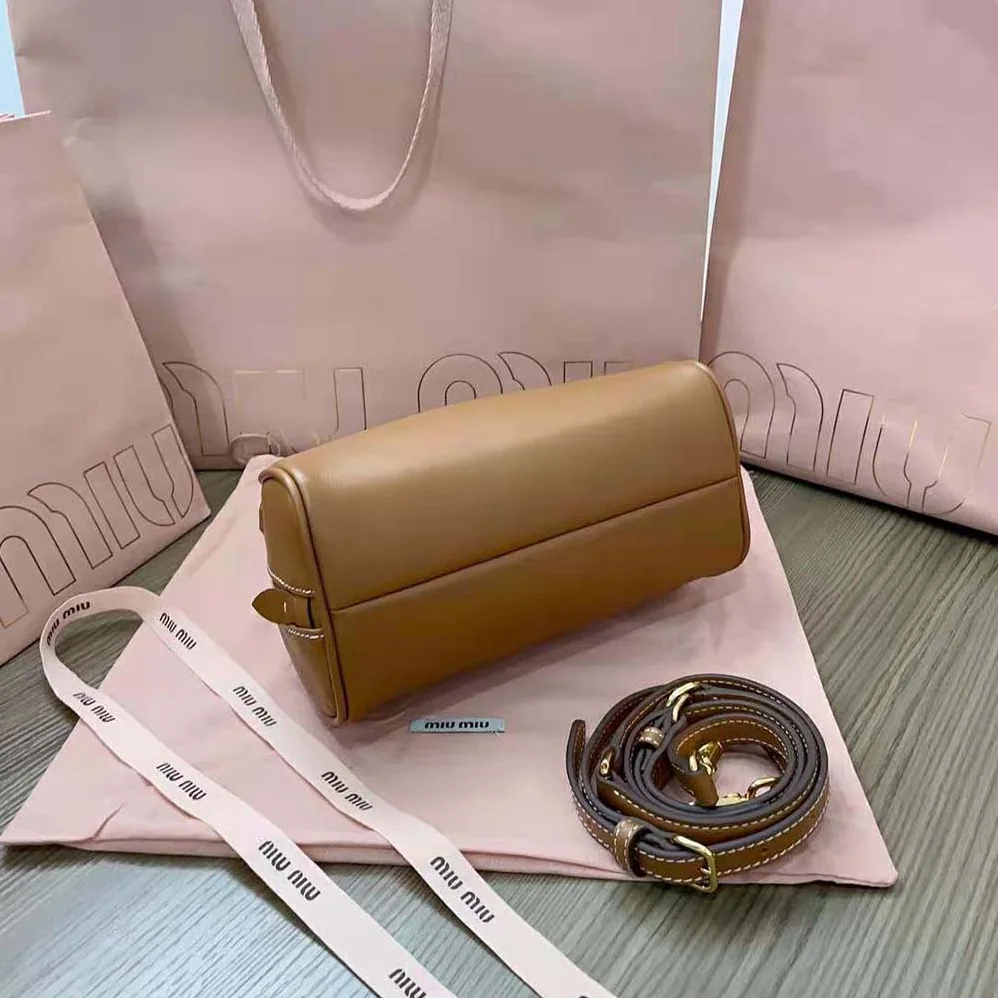 Miu Miu Medium Leather Top-handle Bag for Women in Brown