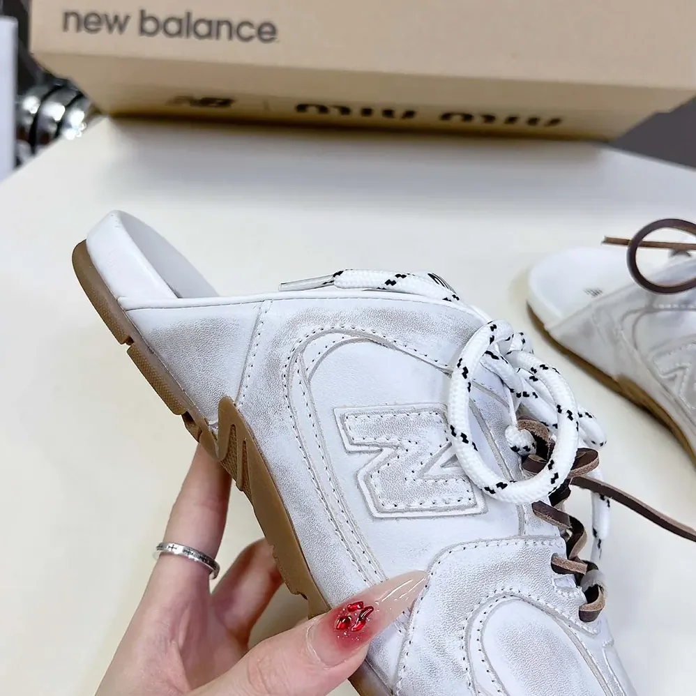 Miu Miu New Balance X Miu Miu 530 SL Deco Calf Leather Mules for Women in White Miu Miu New Balance X Miu Miu 530 SL Deco Calf Leather Mules for Women in White