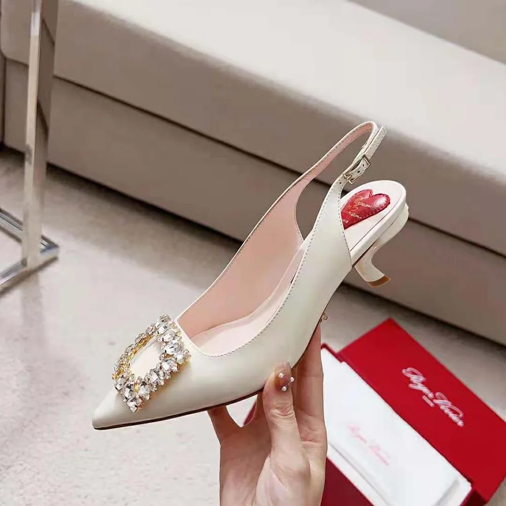 Roger Vivier Virgule Strass Buckle Slingback Pumps in Patent Leather for Women in White Roger Vivier Virgule Strass Buckle Slingback Pumps in Patent Leather for Women in White