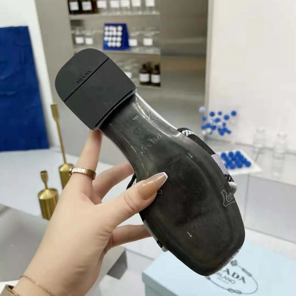 Prada Embroidered Fabric Slides for Women in Blue