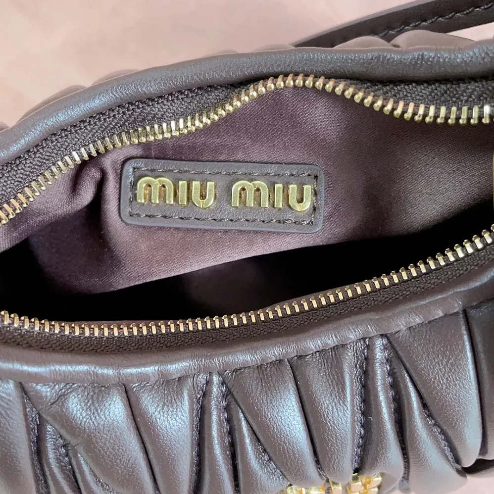 Miu Miu Wander Matelassé Nappa Leather Hobo Mini-Bag for Women in Burgundy
