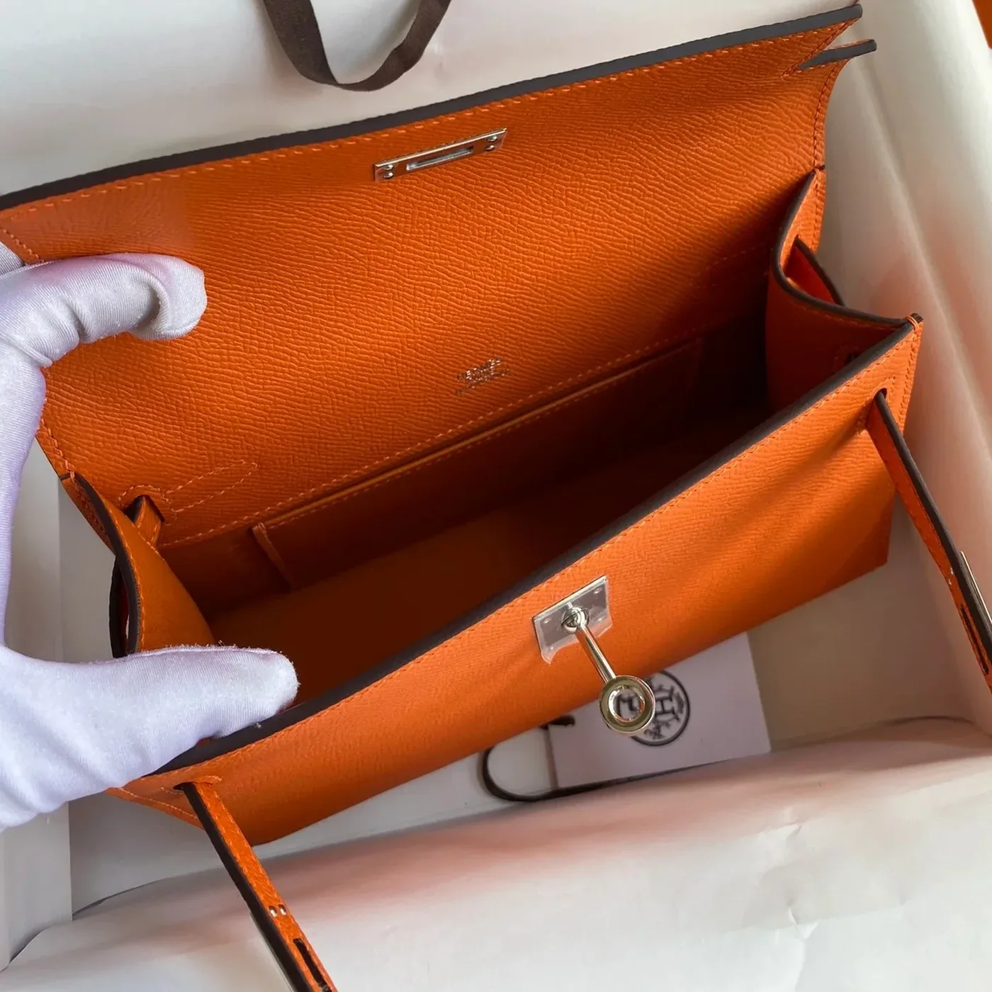 Hermes Kelly Pochette Top Handle Bag in Orange Epsom Palladium Hardware