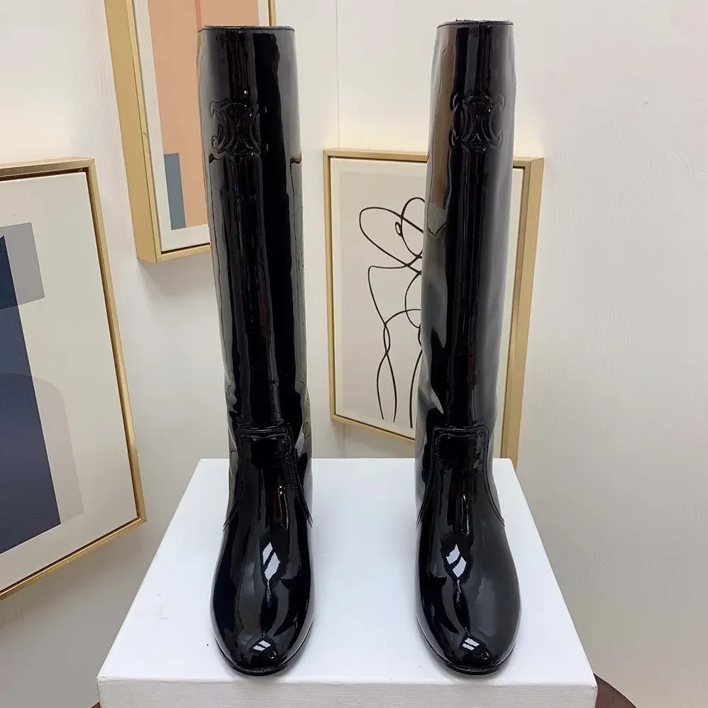 Celine Les Bottes Celine Triomphe High Boot in Patent Calfskin for Women in Black