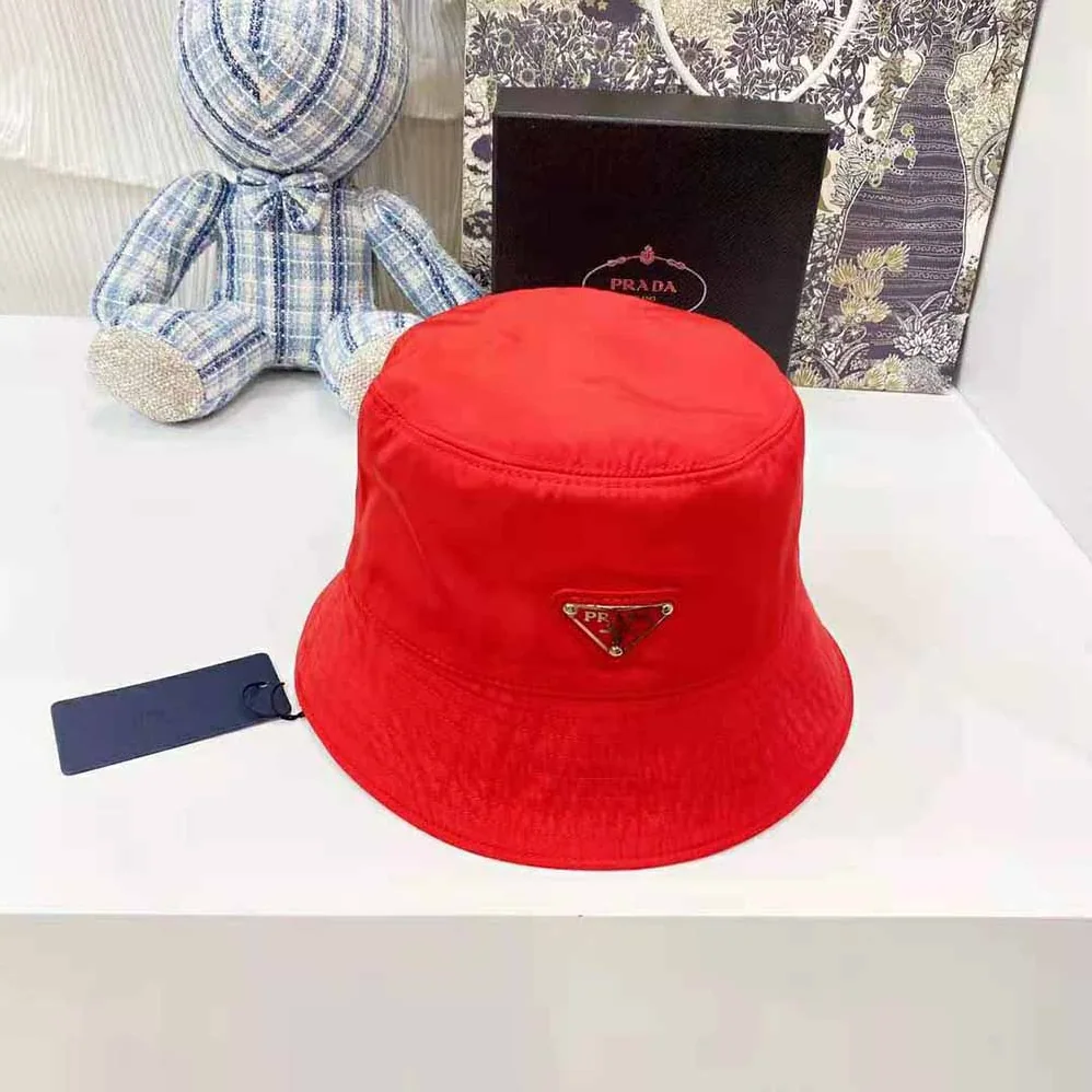 Prada Nylon Bucket Hat Decorated with the Triangle Logo for Women in Red