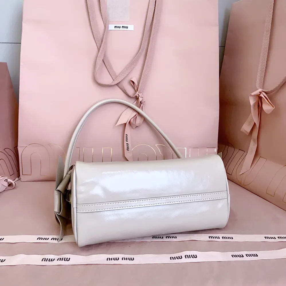 Miu Miu Shiny Leather Pouch for Women in Pink Miu Miu Shiny Leather Pouch for Women in Pink