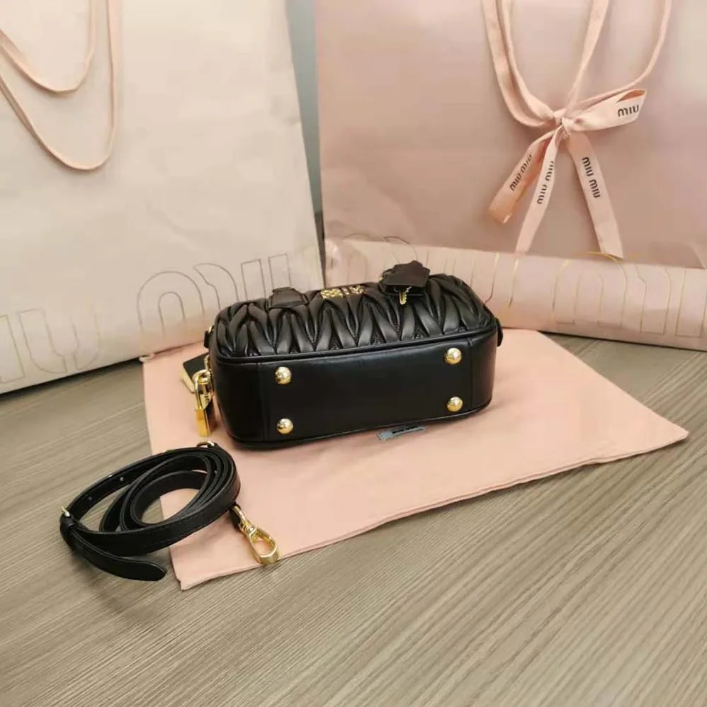 Miu Miu Matelassé Nappa Leather Top-Handle Bag for Women in Black