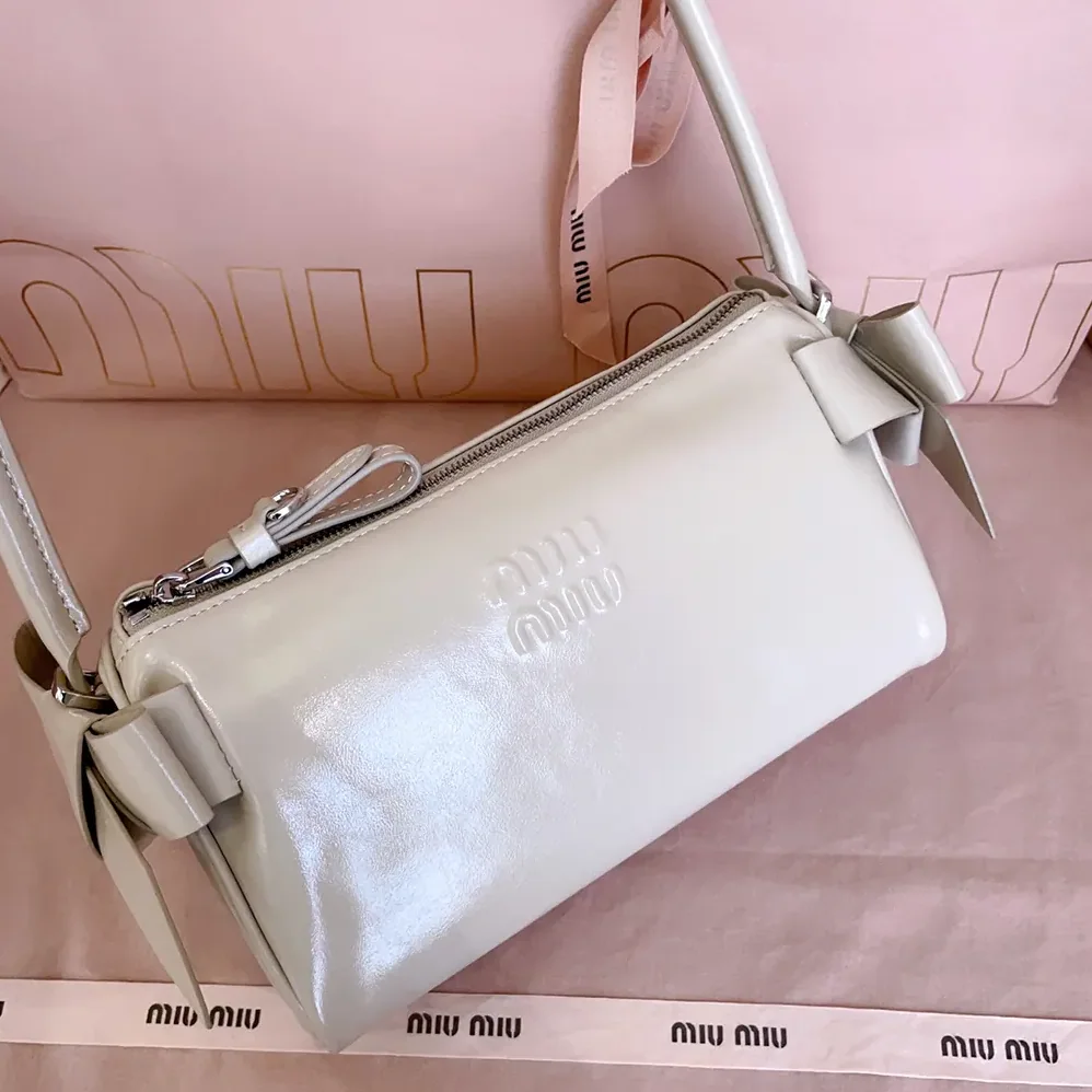 Miu Miu Shiny Leather Pouch for Women in Pink Miu Miu Shiny Leather Pouch for Women in Pink