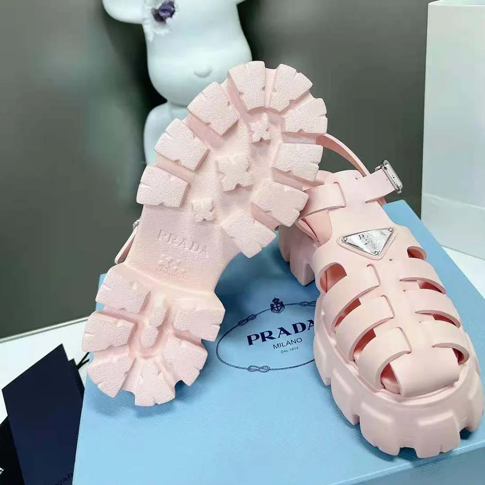 Prada Foam Rubber Sandals with Enameled Metal Triangle Logo for Women in Pink