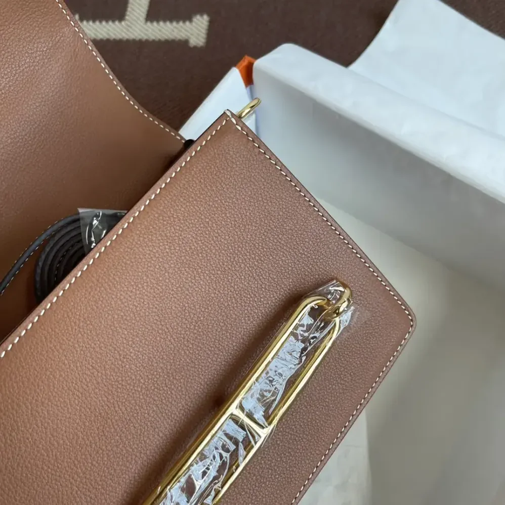 Hermes Roulis Mini Bag in Evercolor Calfskin for Women in Brown/Gold Hermes Roulis Mini Bag in Evercolor Calfskin for Women in Brown/Gold