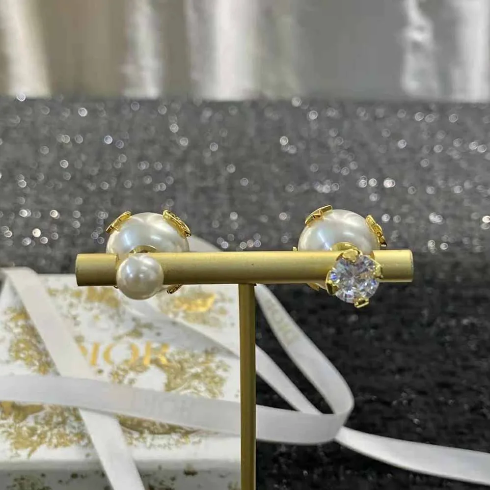 Dior Dior Tribales Earrings Gold-Finish Metal with White Resin Pearls and a Silver for Women in Tone Crystal Dior Dior Tribales Earrings Gold-Finish Metal with White Resin Pearls and a Silver for Women in Tone Crystal