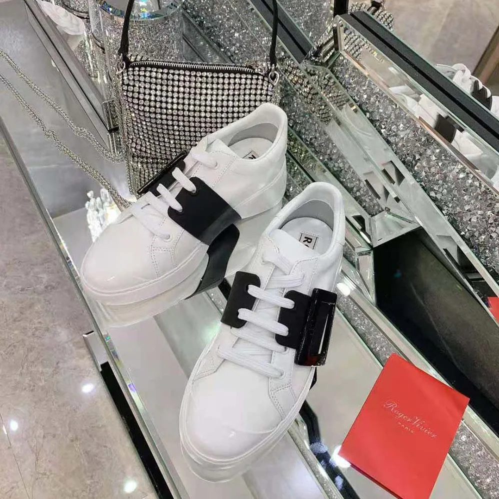 Roger Vivier Viv Skate Lacquered Buckle Sneakers in Soft Leather for Women in Black Roger Vivier Viv Skate Lacquered Buckle Sneakers in Soft Leather for Women in Black