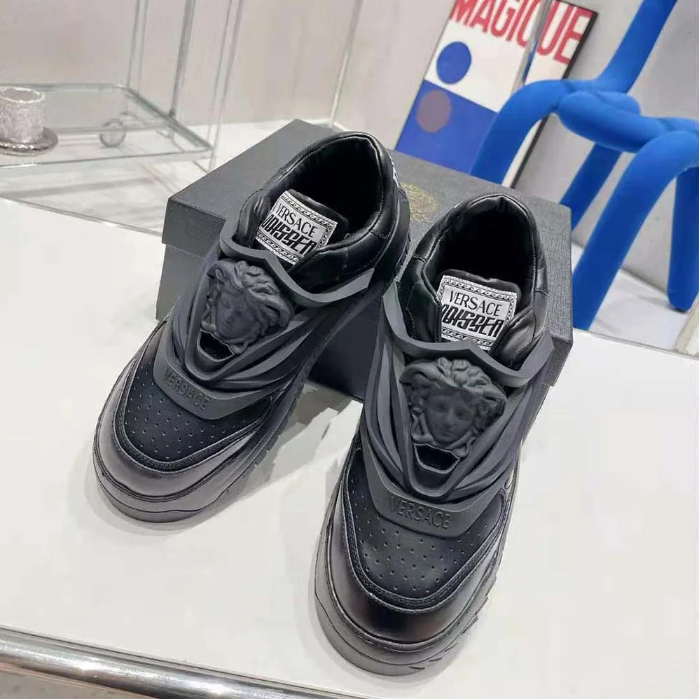 Versace Odissea Sneakers are Set on Rubber Soles with Perforated Toe Caps for Unisex in Black Versace Odissea Sneakers are Set on Rubber Soles with Perforated Toe Caps for Unisex in Black
