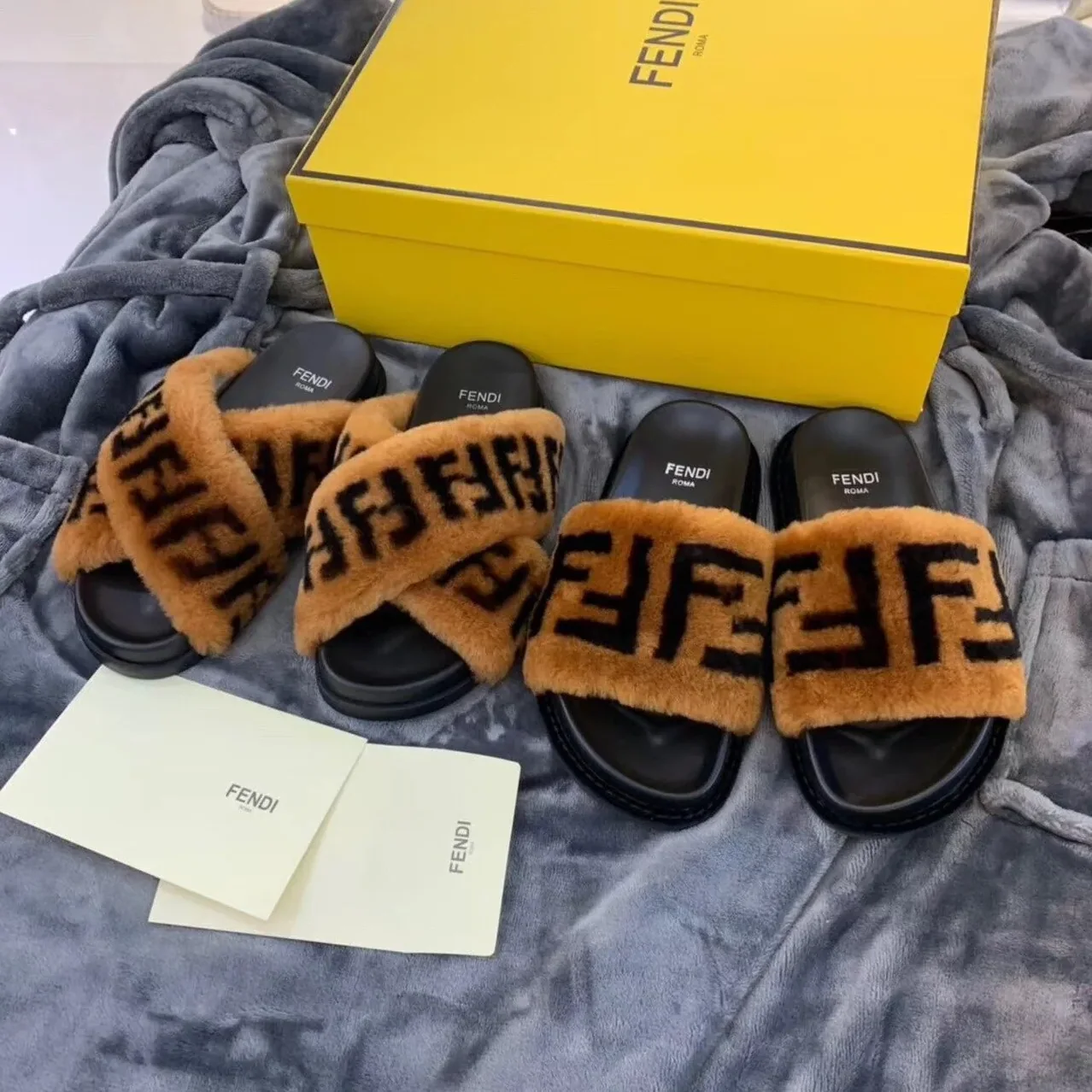 Fendi Shearling FF Logo Leather & Dyed Shearling Fur Cross Slides Fall/Winter 2019 Collection, Black in Brown Fendi Shearling FF Logo Leather & Dyed Shearling Fur Cross Slides Fall/Winter 2019 Collection, Black in Brown