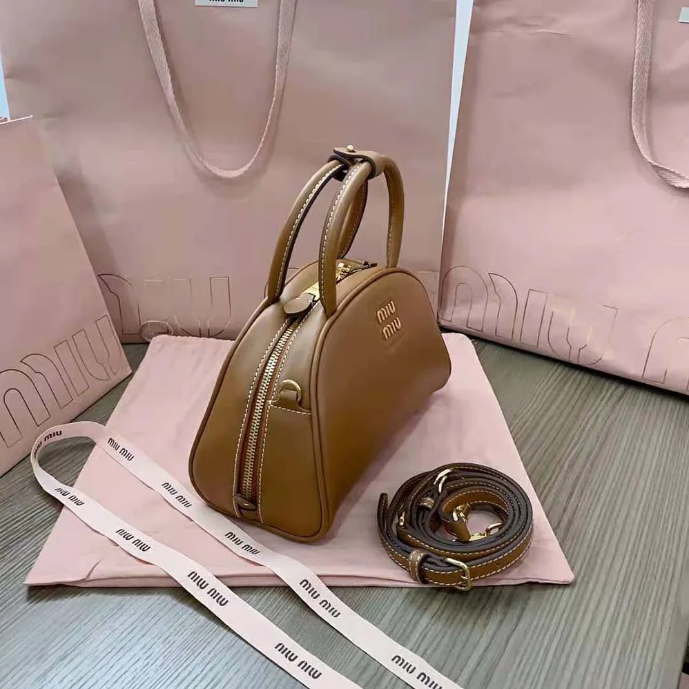 Miu Miu Medium Leather Top-handle Bag for Women in Brown